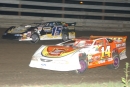 Brian Birkhofer (15) of Muscatine, Iowa, repelled challenges from Kyle Berck (14) to lead all 30 laps en route to winning the first World Dirt Racing League-sanctioned main event on July 31, 2003, at Southern Iowa Speedway in Oskaloosa. (Todd Turner)