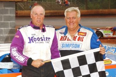 Skip Arp (left) drove Freddy Smith's car to a 2003 victory at Atomic Speedway. (DirtonDirt.com)