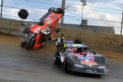 Chris Wilson (5) flips after a tangle with Vic Hill (1) in a heat race. (thesportswire.net)
