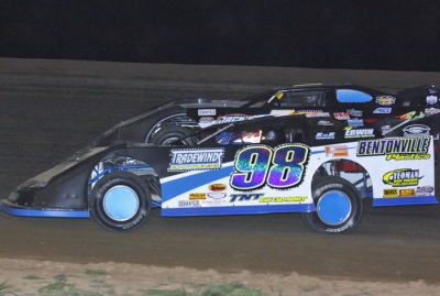 Justin Wells (98) heads for victory at Monett. (Ron Mitchell)