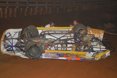 Rick Rogers wasn't hurt in this rollover. (mrmracing.net)