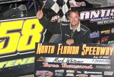 Mark Whitener celebrates at North Florida. (ricksdarkroom.com)