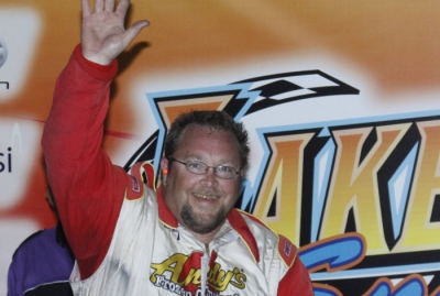 Terry Phillips emerges in victory lane. (Ron Mitchell)