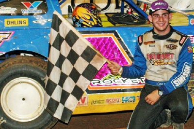 Josh Richards celebrates after a World of Outlaws victory at Columbus (Miss.) Speedway in 2006. (Tim Henry)