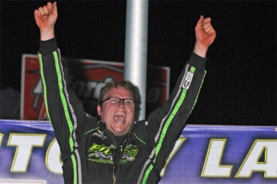 Jason Feger celebrates in victory lane at Tri-City Speedway. (de-photos.com)
