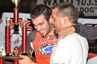 Dustin Linville enjoys victory lane at Mountain Motor Speedway. (photobyconnie.com)