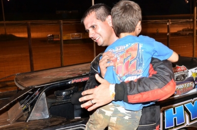 Josh Putnam is welcomed to victory lane with a hug. (photobyconnie.com)