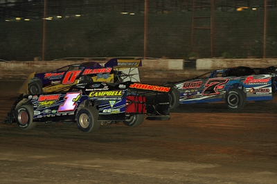 Davey Johnson (1) takes the lead on his way to winning the second feature. (Todd Battin)