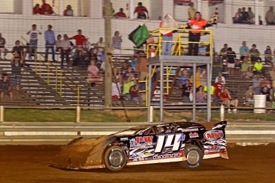 Morgan Bagley takes the checkers in leading his only lap. (Woody Hampton)