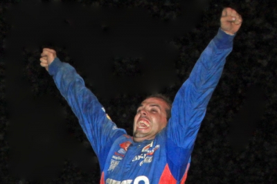 Jesse Stovall celebrates atop his car in victory lane. (stlracingphotos.com)