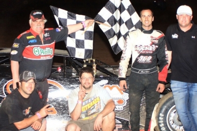 Shane Hebert (second from right) and teammates celebrates his victory in his Late Model debut. (Best Photography)