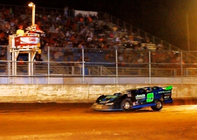 Mike Knight takes the checkers at McKean County. (Joe Nowak)