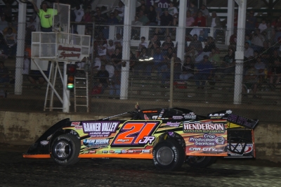Billy Moyer Jr. takes the checkers for a $5,000 victory at Brownstown, Ind. (Jeremey Rhoades)