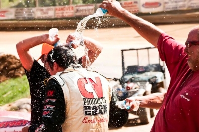 Chris Ferguson is doused with water in victory lane. (peepingdragonphotography.com)