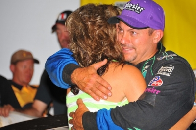 Stephanie Madden gives title-winning Chris a hug at Tazewell. (mrmracing.net)