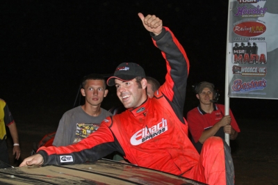 Billy Moyer Jr. emerges from his car after his Comp Cams victory in Harrisburg, Ark. (Woody Hampton)