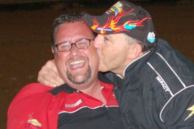 Winner Lucky Keeton kisses series founder Mike Vaughn. (mikessportsimages.com)