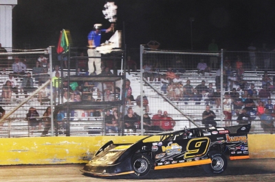 Shane Hebert takes the checkers at Golden Triangle Raceway. (ronskinnerphotos.com)
