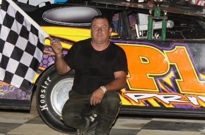 Tim Prince picks up the checkers at Twin Cities. (Jeremey Rhoades)