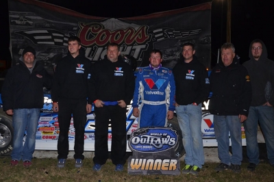 The Rocket Chassis house car team enjoys victory lane. (Troy Bregy)