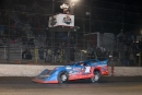 Brandon Sheppard takes the $20,000 checkers in Feb. 14's Federated Auto Parts DIRTcar Nationals finale at Volusia Speedway Park in Barberville, Fla. (mikerueferphotos.photoreflect.com)