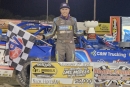 Nick Hoffman poses in victory lane after capturing Feb. 21's World of Outlaws Late Model Series Swamp Cabbage 100 finale at Hendry County Motorsports Park in Clewiston, Fla. (Mike Butcosk)