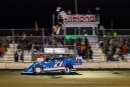 Hudson O'Neal flashes under the checkered flag for a $10,000 victory in Feb. 26's 40-lap Wieland Winternationals feature at Ocala (Fla.) Speedway. (heathlawsonphotos.com)