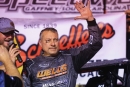 Chris Madden waves in victory lane March 21 at Cherokee Speedway in Gaffney, S.C., after his Ginger Owens Memorial March Madness victory. (zskphotography.com)