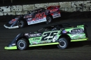 Ryan Unzicker (24) repelled Jason Feger (25) in May 23's MARS Championship Series feature at Fairbury (Ill.) Speedway. (joshjamesartwork.com)