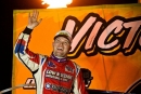 Bobby Pierce waves in victory lane June 24 at I-94 EMR Speedway in Fergus Falls, Minn., after his third straight World of Outlaws Late Model Series victory. (Emily Schwanke/woolms.com)