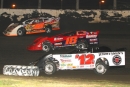 Brian Shirley (48), Shannon Babb (18) and Kevin Weaver (B12) mixed it up at Fairbury with Weaver coming out on top. (Jeff Hall)