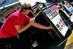 Crew chief Shane McDowell checks out the car of Jared Landers on Thursday's technical inspection day for the 40th annual World 100.  (thesportswire.net)