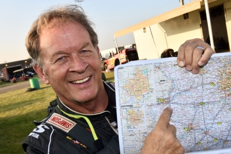 Mick Quin and his trusty atlas. (DirtonDirt.com)