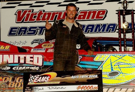 Mark Whitener enjoys victory lane at EAMS. (Rick Anges)