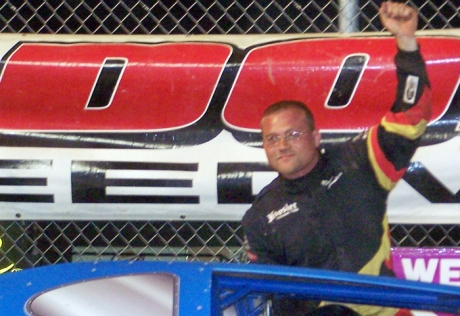 Duane Chamberlain emerges in victory lane. (Dustin Jarrett)