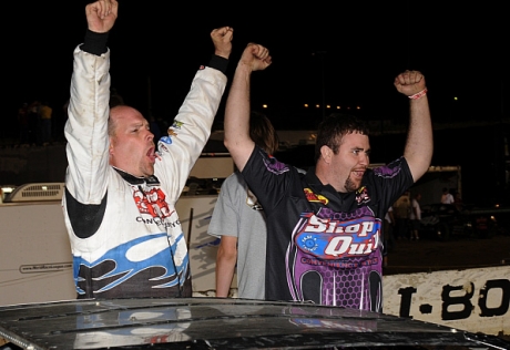 John Anderson and crew chief Bryan Larimore celebrate. (Lloyd Collins)