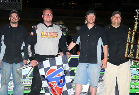 Jason Feger and his crew celebrate. (mikerueferphotos.photoreflect.com)