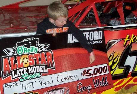 Rod Conley's son points out Dad's earnings. (Dustin Jarrett)