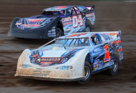 Boom Briggs (1*), battling with Bob Close (04), drove a Chub Frank car to victory. (oyleractionphotos.com)