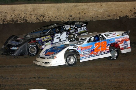 Dennis Erb Jr. (28) closes in on Ryan Unzicker (24). (mikerueferphotos.photoreflect.com)