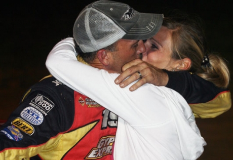 Tim Fuller got a kiss from wife Lori at Sharon. (Todd Battin)