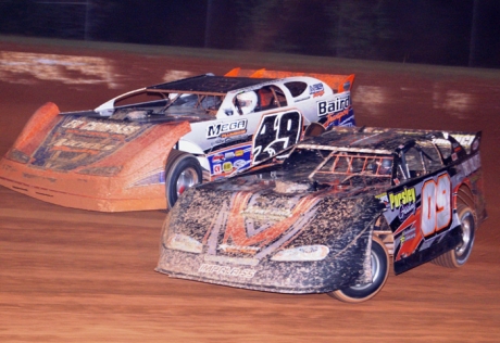 Johnny Pursley (09) battles Jonathan Davenport (49). (Randy Houser)