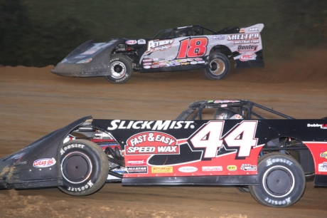 Winner Earl Pearson Jr. (44) works on runner-up Shannon Babb. (18). (Jeremey Rhoades)