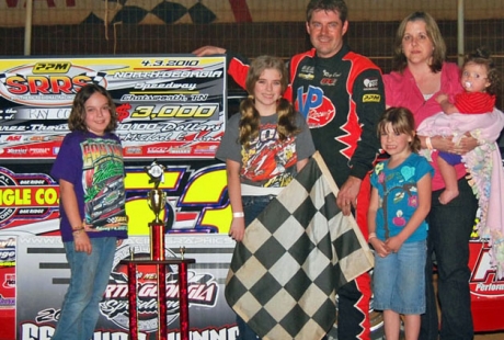 The Cook clan enjoys victory lane. (photobyconnie.com)