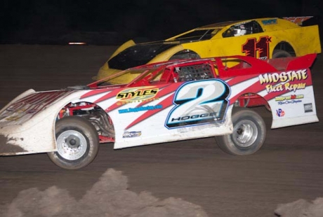 Bobby Hogge IV (2) slides under Steve Drake (11x) at Chowchilla. (raceimages.net)