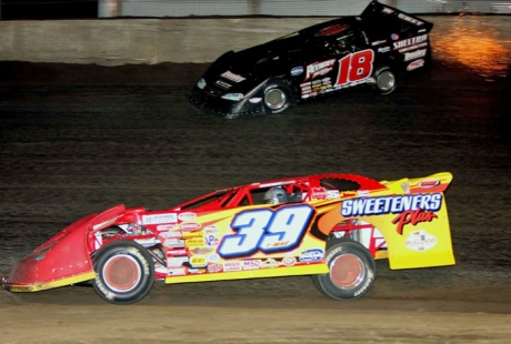 Tim McCreadie (39) battles Shannon Babb (18). (Jim DenHamer)