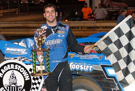 Richards holds the checkered flag at Hagerstown. (wrtspeedwerx.com)