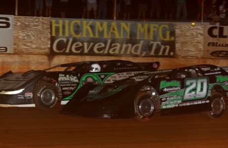 Jimmy Owens (20) battles Scott Bloomquist (0). (rickschwalliephotos.com)