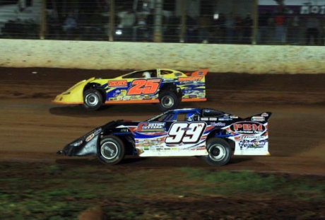 Donnie Moran (99) regains the lead from Shane Clanton (25). (Barry Lenhart)