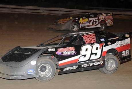 Terry Phillips (75) battles Eric Turner (99T). (fasttrackphotos.net)